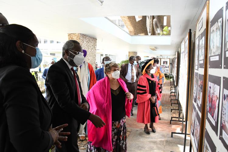 Vice Chancellor, Chancellor and Chair of council tour the photo exhibition