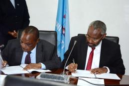 Prof. Isaac Mbeche ag VC and Prof. Kiama, DVCHRA sign 2019_2020 PC